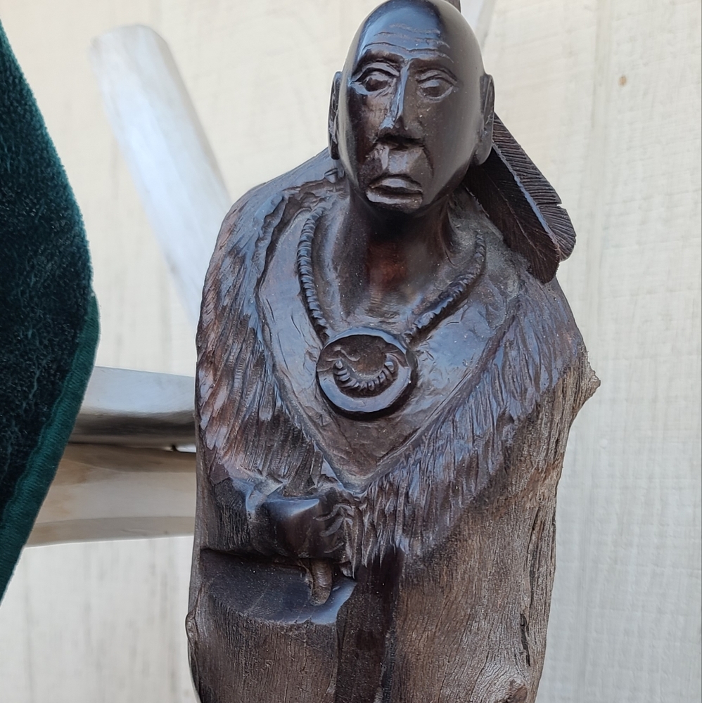 Iron wood Statue